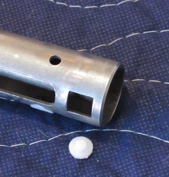 piston hole and button